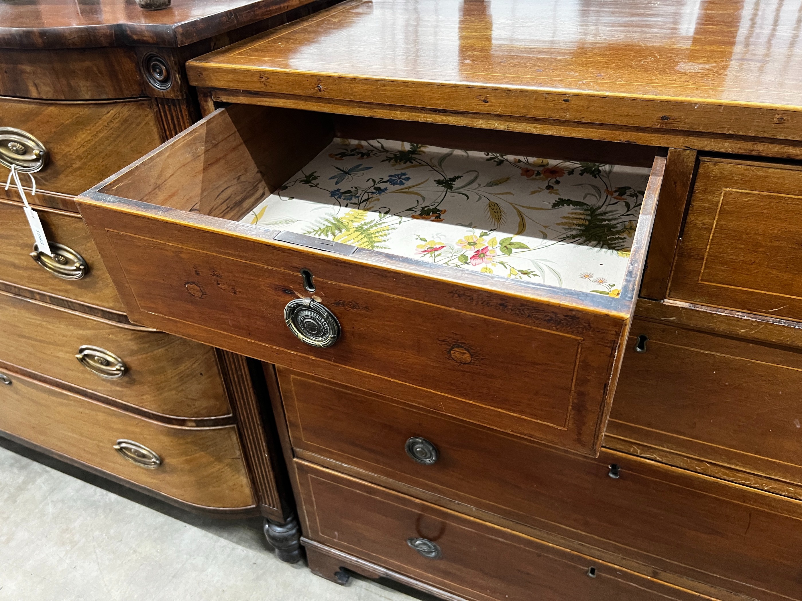 A Regency inlaid mahogany chest of drawers, width 108cm, depth 49cm, height 104cm